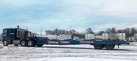 Eastland Towing Landoll trailer used for transporting large loads like mobile homes, office trailers and industrial equipment.